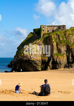 View over Castle Beach in Tenby a seaside resort in Pembrokeshire South Wales with Fort St Catherine and Carmarthen Bay beyond Stock Photo