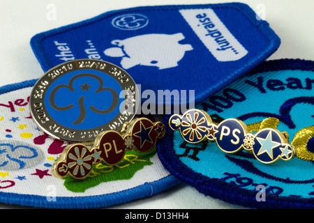 Boy Scout Uniform and Badges', 1944. 'Patrol leader's hat badge; scarf of  troop colour; all-round cords for six badges; staff of shoulder height,  with patrol flag (Woodpigeon Patrol); scout badge on pocket