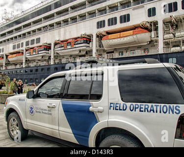 July 6, 2012 - Ketchikan Gateway Borough, Alaska, US - A Field Operations car of U.S. Customs & Border Protection on the Ketchikan, Alaska docks with the Holland America Line cruise ship â€œZaandamâ€ in the background. (Credit Image: © Arnold Drapkin/ZUMAPRESS.com) Stock Photo