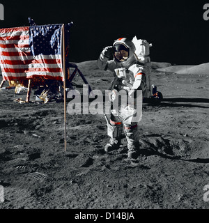 Astronaut Gene Cernan, Apollo 17 commander, salutes the United States flag on the lunar surface during extravehicular activity (EVA) of NASA's final lunar landing mission in the Apollo series December 13, 1972. The crew spent 12.5 days in space, including three days on the lunar surface and is the last time man set foot on the moon. Stock Photo