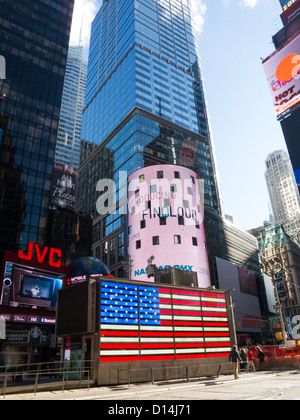 U.S Armed Forces Recruiting Station featuring large neon American flag, Times Square, NYC Stock Photo