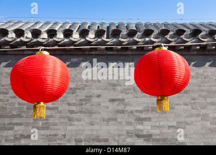 two red lantern hanging against gray wall for celebration Chinese new year Stock Photo