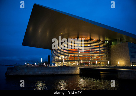 Copenhagen's opera house on the harbour waterfront at dusk in winter Stock Photo