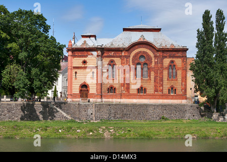 Former synagogue, now the Philharmonic Orchestra House, on the bank of the river Uzh. Uzhhorod, Ukraine.