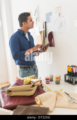 USA, New Jersey, Jersey City, Fashion designer in studio Stock Photo