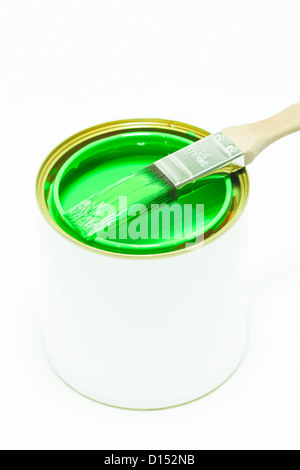 Can with green oil paint. Very shallow DOF. Isolated on white. Stock Photo