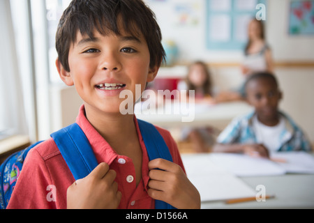 USA, New Jersey, Jersey City, Portrait of schoolboy (8-9) in classroom Stock Photo