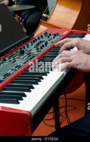 Close-up of a pianist playing a keyboard in a jazz band Stock Photo