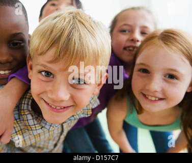 USA, New Jersey, Jersey City, Portrait of smiling school children (8-9) Stock Photo