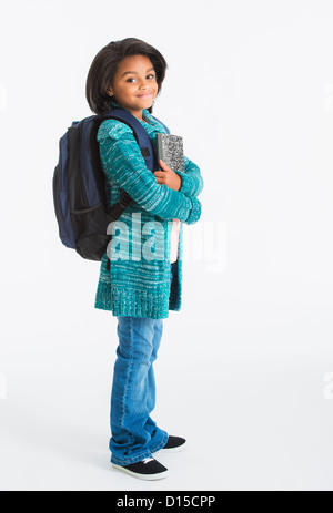 Studio shot of schoolgirl (6-7 years) Stock Photo