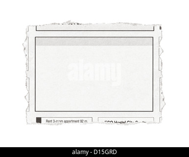 Piece of paper with advertisement space torn out from newspaper. Isolated on white. Stock Photo