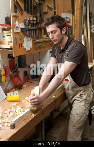 duesseldorf, germany, master and apprentice in carpentry