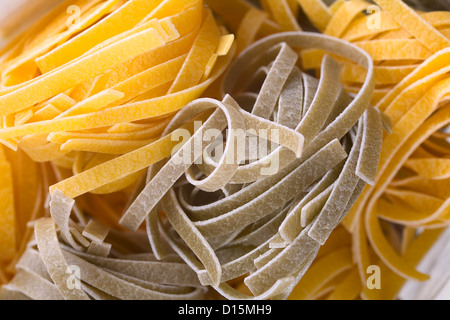 Close up ff a raw colored pasta in a plastic bag Stock Photo