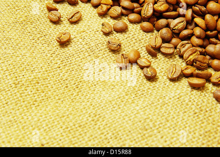Coffee beans on a sack background Stock Photo