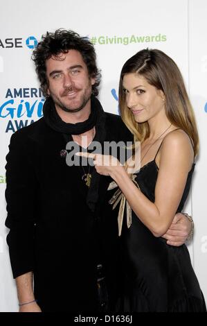 Bryn Mooser, Dawn Olivieri at arrivals for American Giving Awards 2012, Pasadena Civic Auditorium, Pasadena, CA December 7, 2012. Photo By: Michael Germana/Everett Collection Stock Photo