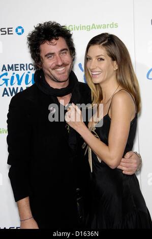 Bryn Mooser, Dawn Olivieri at arrivals for American Giving Awards 2012, Pasadena Civic Auditorium, Pasadena, CA December 7, 2012. Photo By: Michael Germana/Everett Collection Stock Photo