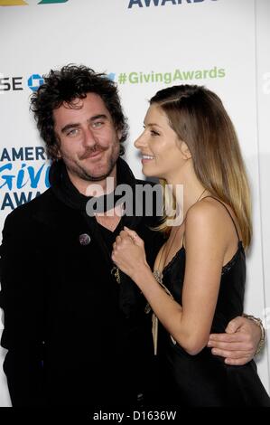 Bryn Mooser, Dawn Olivieri at arrivals for American Giving Awards 2012, Pasadena Civic Auditorium, Pasadena, CA December 7, 2012. Photo By: Michael Germana/Everett Collection Stock Photo