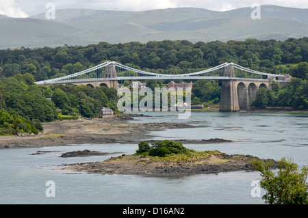 Menai Bridge designed by Thomas Telford crossing the Menai Straits waterway by road connecting island of Anglesey with the North Wales UK mainland Stock Photo