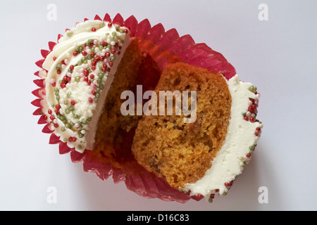 Christmas mince pie cupcake cut in half, halved, isolated on white background Stock Photo