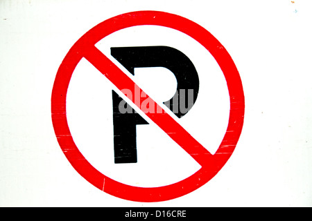Worn no parking traffic sign in front of white background Stock Photo