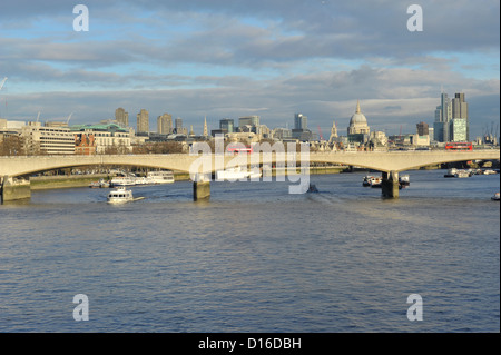 Waterloo Bridge, London, UK as seen from Hunngerford bridge with city of London behind.. looking along the Thames river Stock Photo