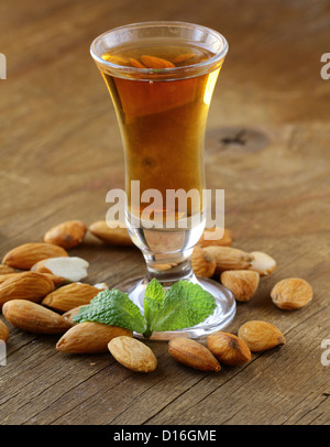 Almond liquor amaretto with whole nuts Stock Photo