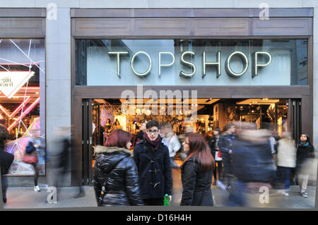 Oxford Street , London, UK. 9th December 2012. Christmas shoppers outside TopShop on Oxford Street. Shoppers fill the streets as they do their Christmas shopping in central London. Alamy Live News Stock Photo