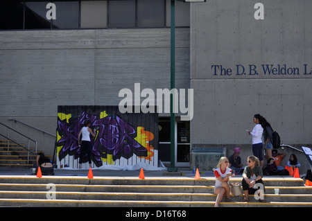 Students painting a mural Stock Photo