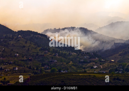 Wildfire smoke rises from burning homes in Colorado Stock Photo