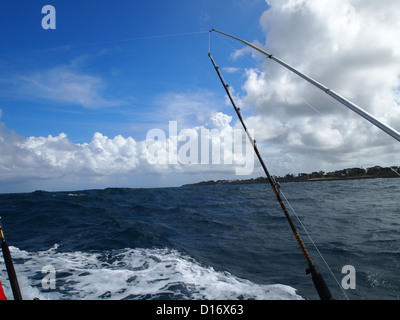 Fishing rods on a boat Stock Photo