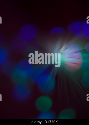 defocused abstract colorful light spots on black background Stock Photo