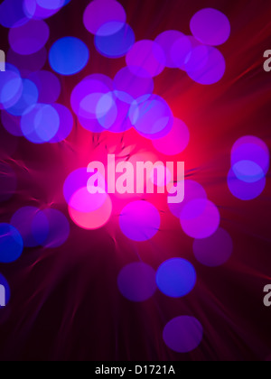 closeup of colorful light spots from a fiber optics light wand Stock Photo