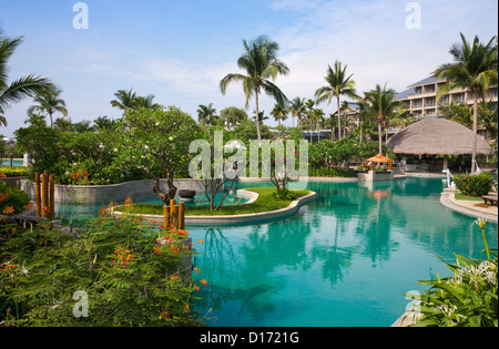 Luxury swimming pool at tropical resort Stock Photo