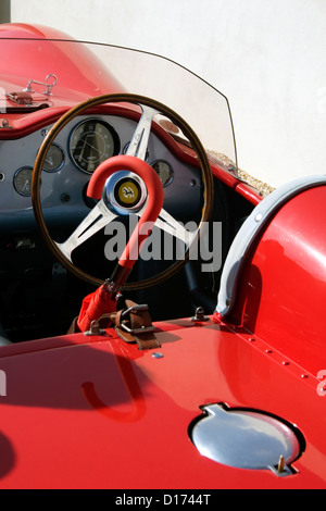 The interior of a classic red Ferrari racing car Stock Photo