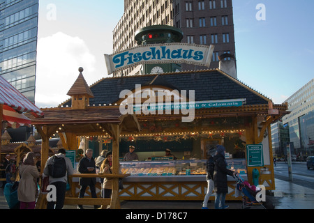 Berlin Germany EU Christmas market stall selling selection fish products Stock Photo