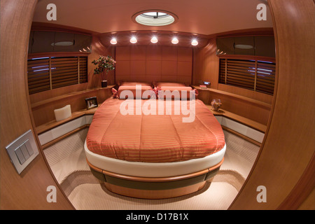 Italy, Baia (Naples), Atlantica luxury yacht (boatyard: Cantieri di Baia), master bedroom Stock Photo