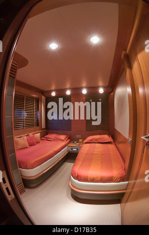 Italy, Baia (Naples), Atlantica luxury yacht (boatyard: Cantieri di Baia), guests bedroom Stock Photo