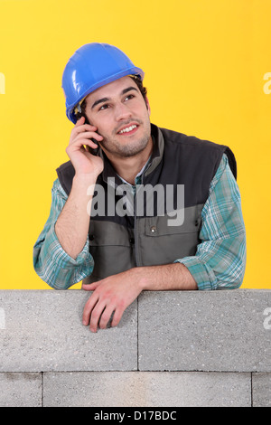 Mason on the phone Stock Photo