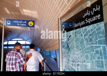 Dubai UAE,United Arab Emirates,Deira,Baniyas Square Metro Station,Green Line,subway,train,train,entrance,interior inside,Asian man men male adult adul Stock Photo