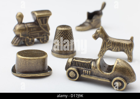 Traditional English edition of the popular board game Monopoly - Car Dog Train Boot Top Hat and Thimble Stock Photo