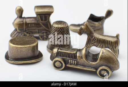 Traditional English edition of the popular board game Monopoly - Car Dog Train Boot Top Hat and Thimble Stock Photo