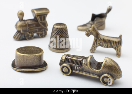 Traditional English edition of the popular board game Monopoly - Car Dog Train Boot Top Hat and Thimble Stock Photo