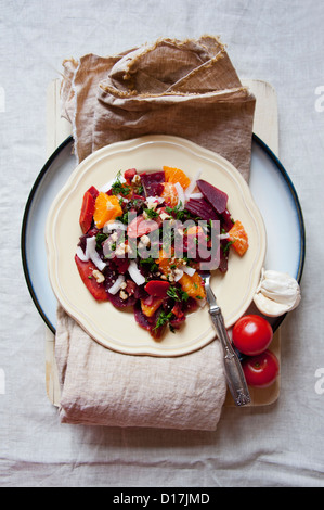 Plate of fish salad with tomatoes Stock Photo