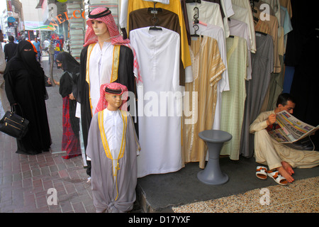 Dubai UAE,United Arab Emirates,Deira,Murshid Bazar,bazaar,shopping shoppers shop shops market buying selling,store stores business businesses,Asians,m Stock Photo