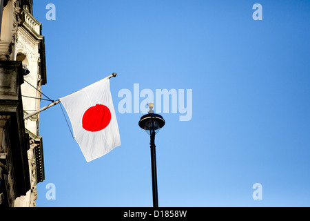 London, 07/12/2012 - Japanese flag outside the Japanese Embassy in Piccadilly, London, UK Stock Photo