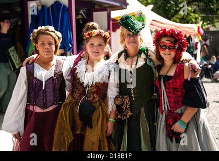 A family dressed in period costumes at The Maryland Renaissance Festival 2012, Crownsville Road, Annapolis, Maryland. Stock Photo