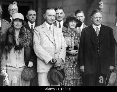 Republican nominee Hoover heads the greeting party for President and Mrs. Coolidge. L-R: First Lady Grace Coolidge, Calvin Stock Photo