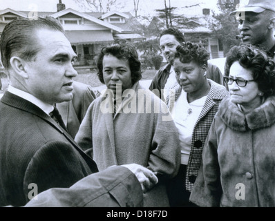 Alabama Gov. George Wallace talks to residents of an African American neighborhood that was bombed. In the 1960's, Birmingham Stock Photo