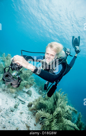 Diver swimming without mask Stock Photo