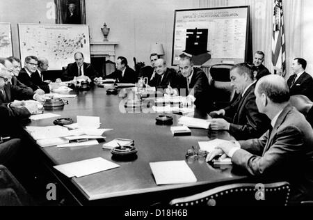 President Lyndon Johnson meets with his Cabinet. A chart lists the status of Congressional legislation. May 16, 1967. L-R: Stock Photo